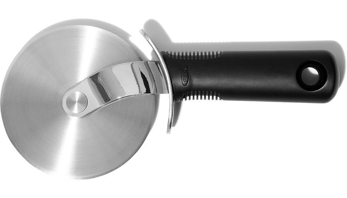 OXO Good Grips 4-inch pizza wheel with a stainless steel blade, thumb guard and black non-slip handle